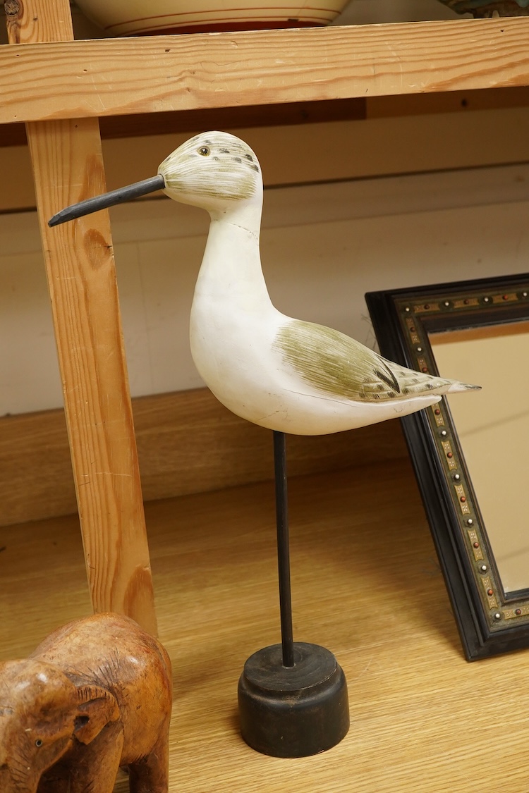 A carved and painted decoy duck, two carved elephants and two other painted birds, tallest 41cm